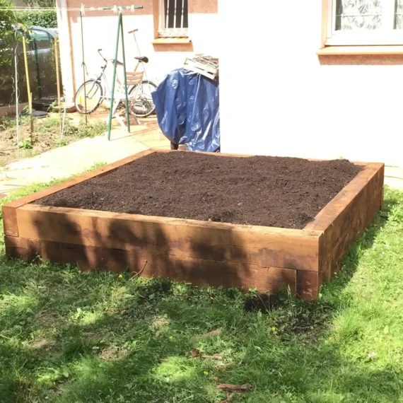 Maçonnerie paysagère massif bac potager jardin